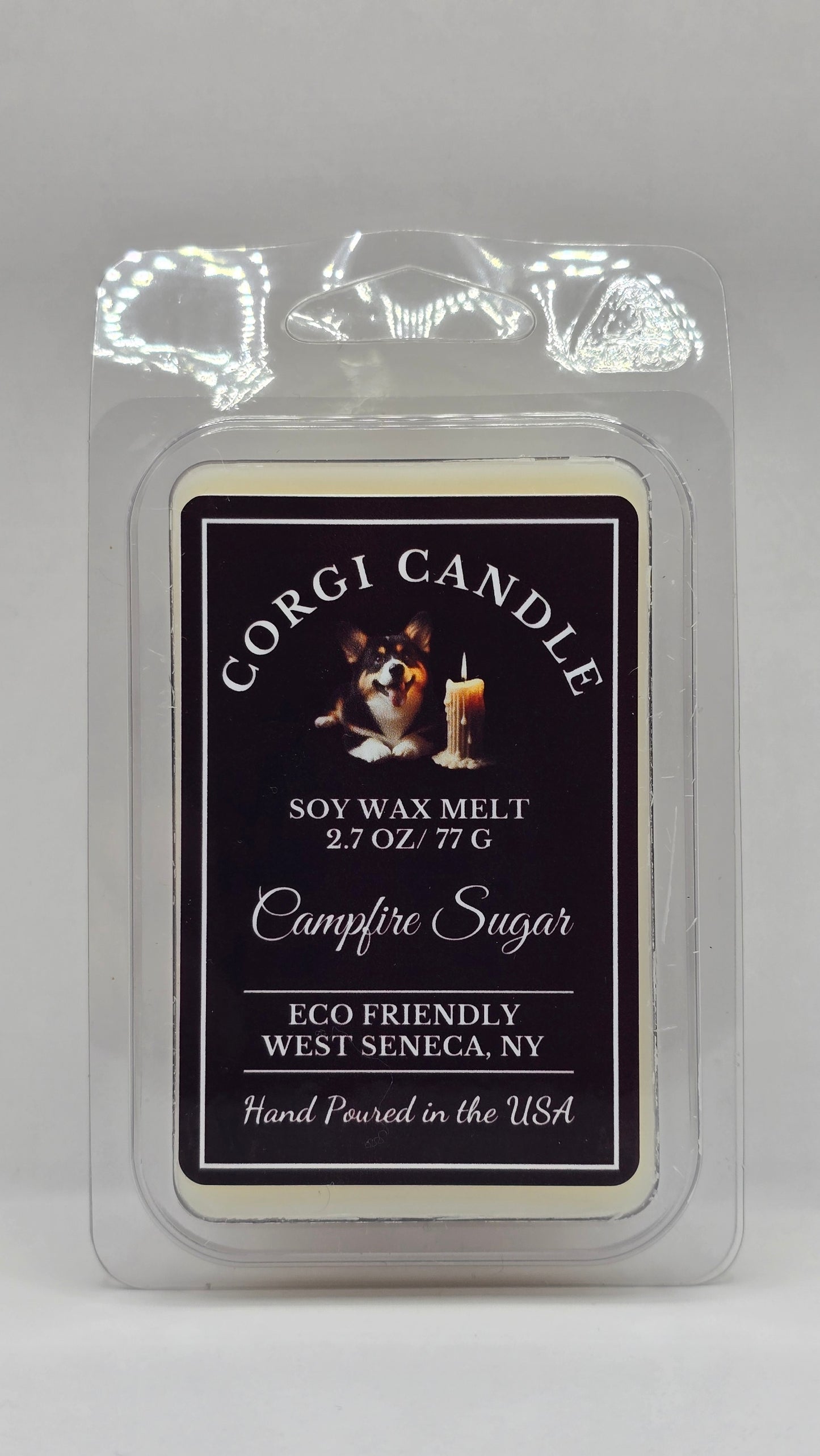 Candle packaging with a label on a gray background