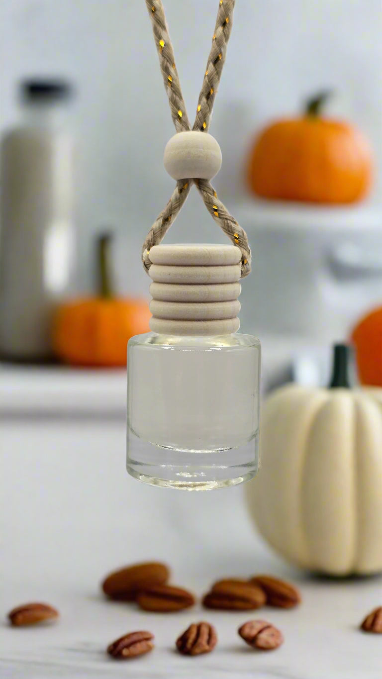 Glass bottle with a white cap and beige cord on a light gray background