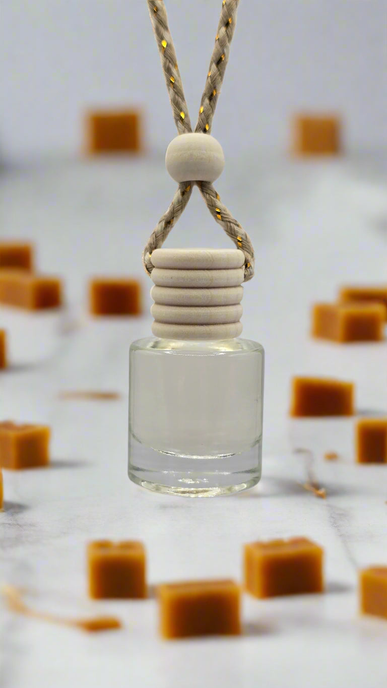 Glass bottle with a white cap and beige cord on a light gray background