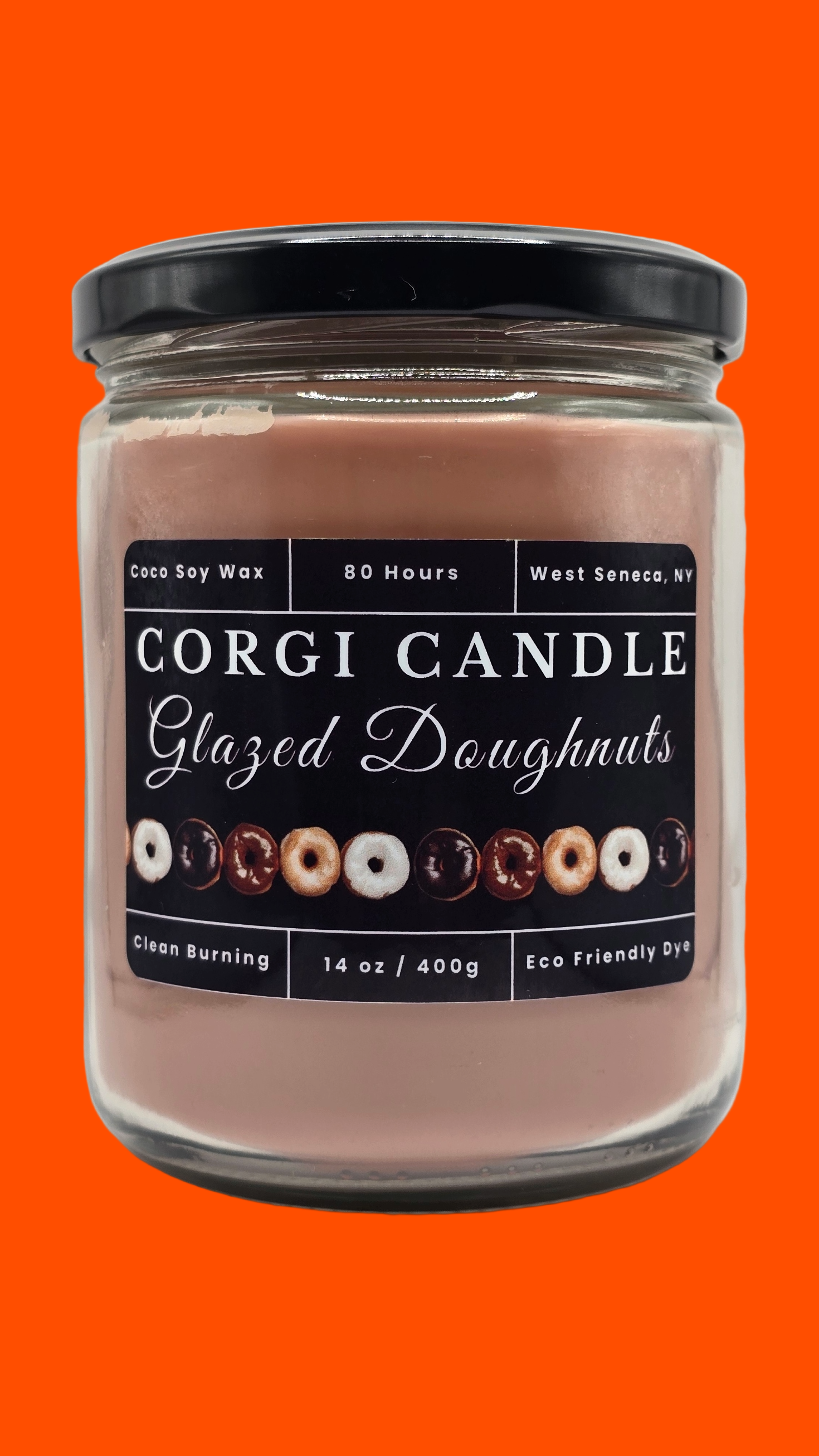 Corgi Candle glazed doughnuts candle in a glass jar with a black lid on a white background