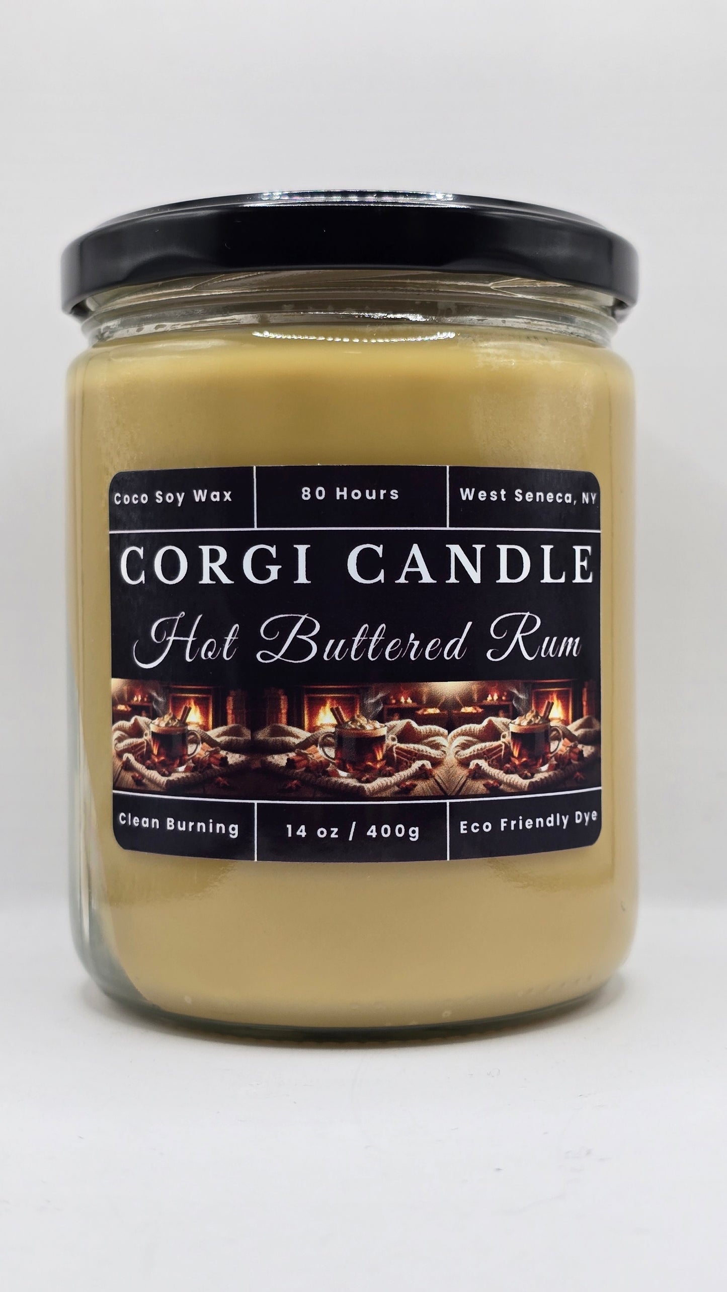 Corgi Candle jar labeled 'Hot Buttered Rum' on a white background