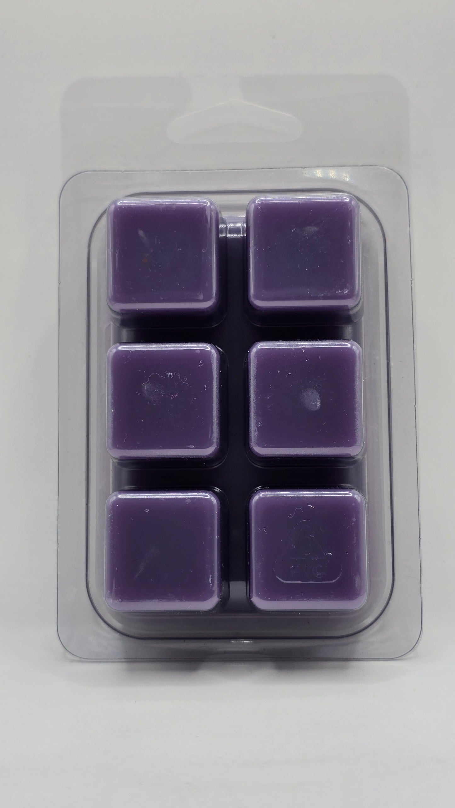 Back of Lemon Lavender soy wax melt showing six wax cubes inside clear plastic clamshell packaging.