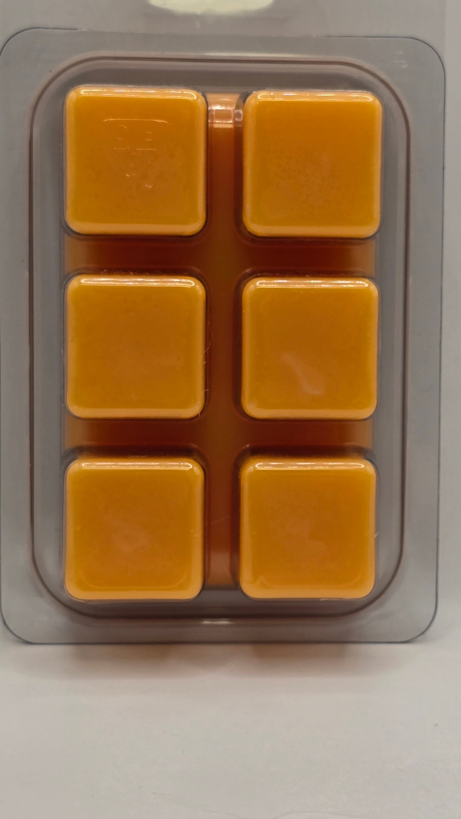 Mango escape wax melt backside of clamshell.