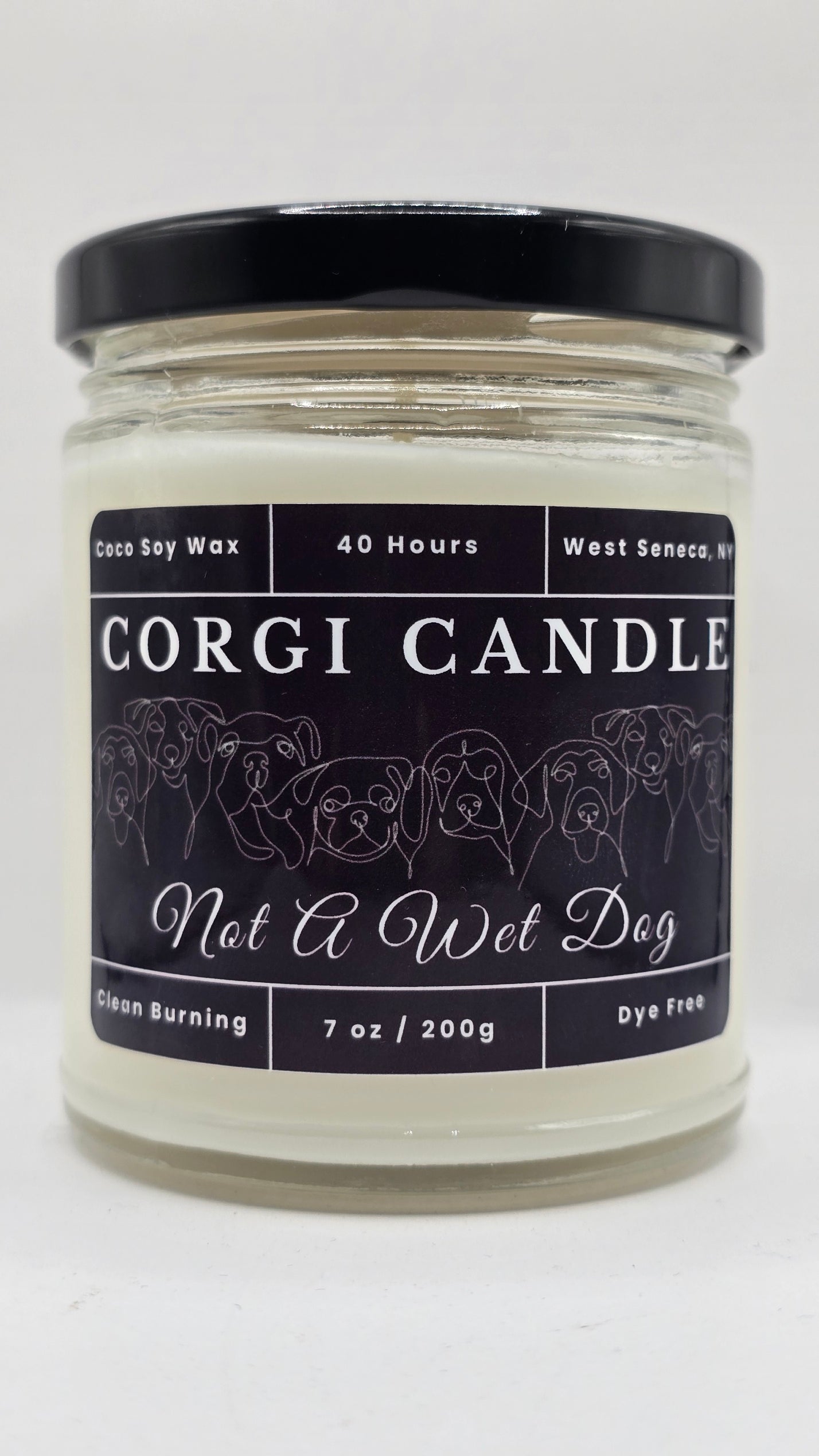 CORGI CANDLE Not a Wet Dog 7 oz soy candle in a clear glass jar with black lid on a white background.
