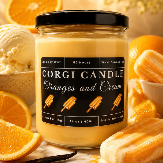 Corgi Candle Oranges and Cream 14 oz scented candle displayed on a white marble surface, surrounded by fresh orange slices, creamy vanilla ice cream, vanilla beans, and orange creamsicle popsicles. Hand-poured with a soy and coconut wax blend for a clean, long-lasting burn.