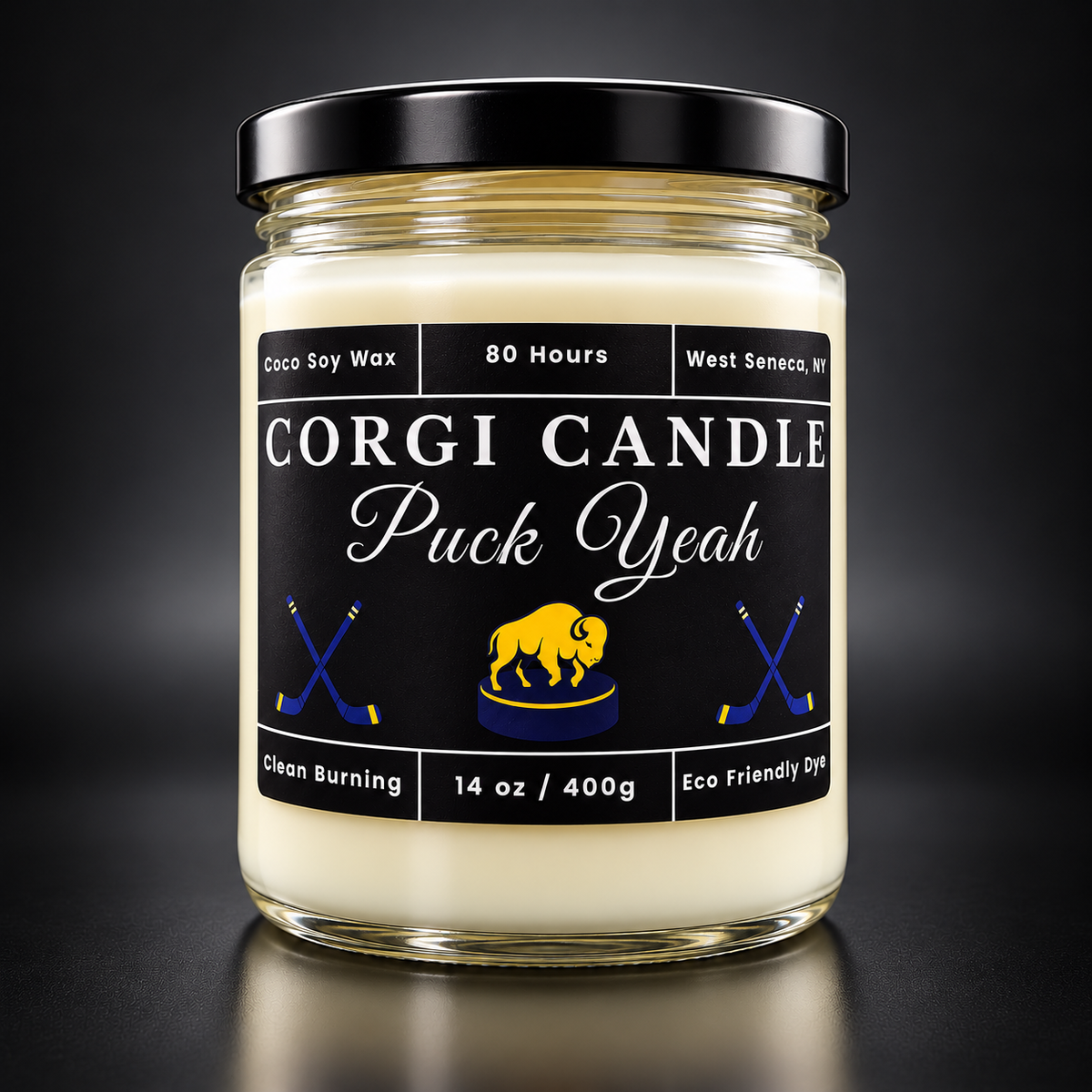 14 oz Puck Yeah soy scented candle by CORGI CANDLE with black hockey-themed label, handcrafted in West Seneca, NY.