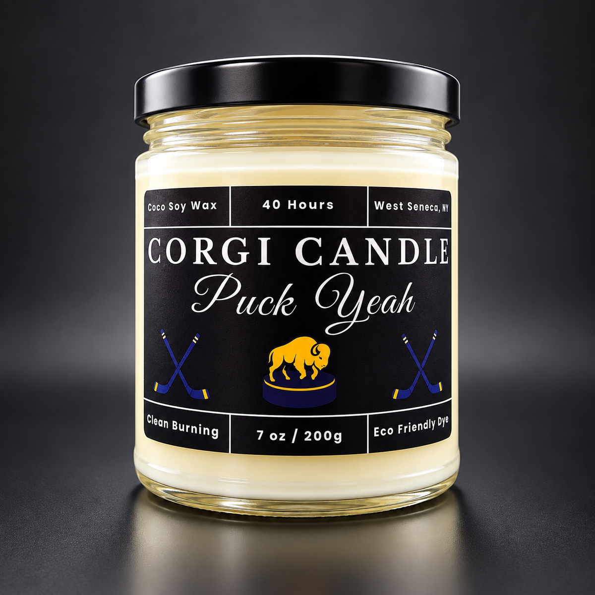 7 oz Puck Yeah soy scented candle by CORGI CANDLE with black hockey-themed label, handcrafted in West Seneca, NY.