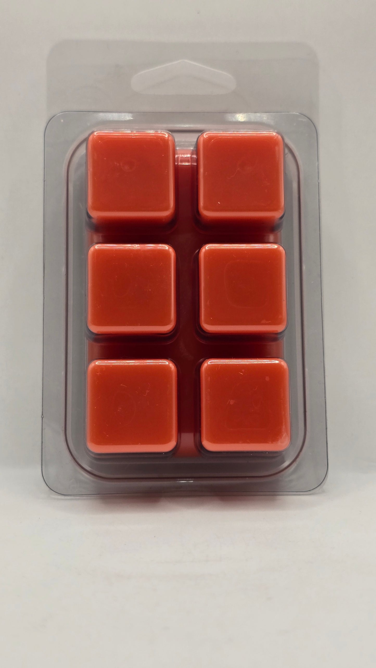 Papaya Passion soy wax melt cubes by CORGI CANDLE in clear clamshell packaging showing six orange wax cubes, 2.7 oz tropical scented wax melt hand poured in West Seneca NY.