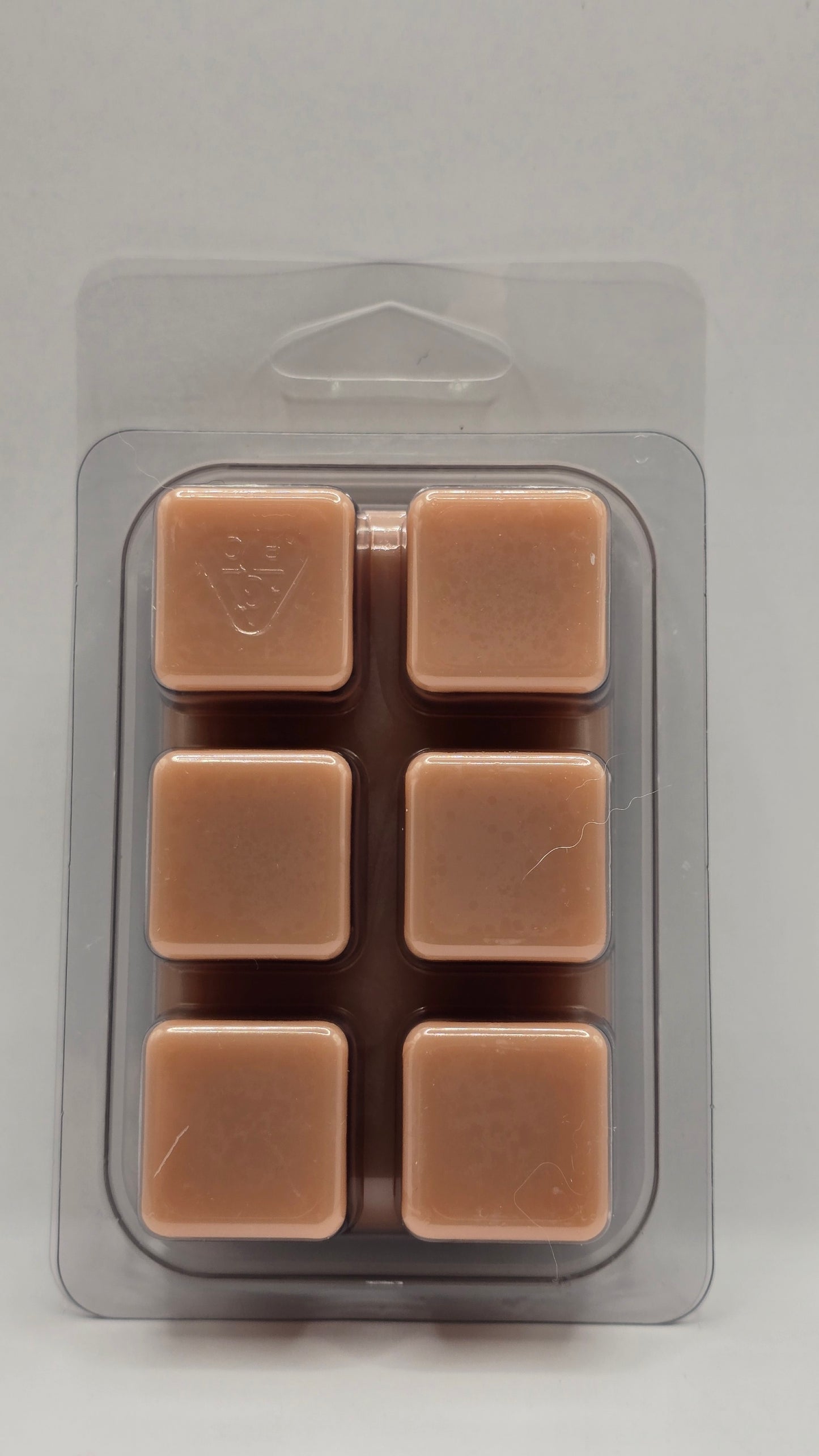 Packaged brown square items on a gray background
