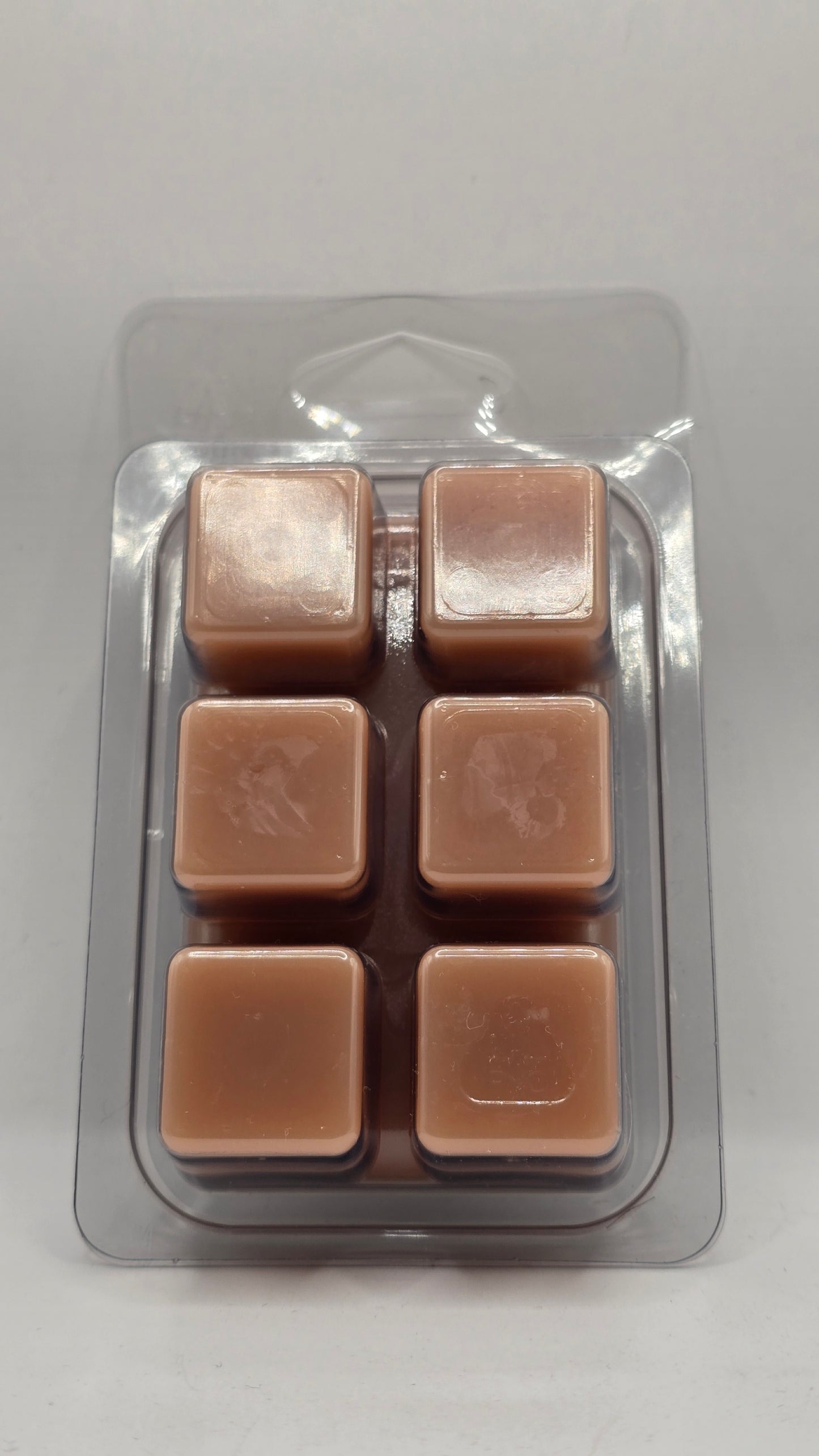 Coco Butter Cashmere soy wax melt cubes by CORGI CANDLE in clear clamshell packaging showing six wax cubes, 2.7 oz cashmere vanilla scented wax melt hand poured in West Seneca NY.