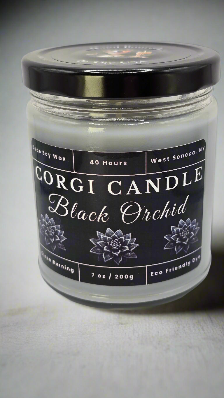 Black Orchid soy candle in a matte black glass jar with a minimalist label featuring a bold floral and woody scent inspired by luxury fragrance, hand-poured by CORGI CANDLE.