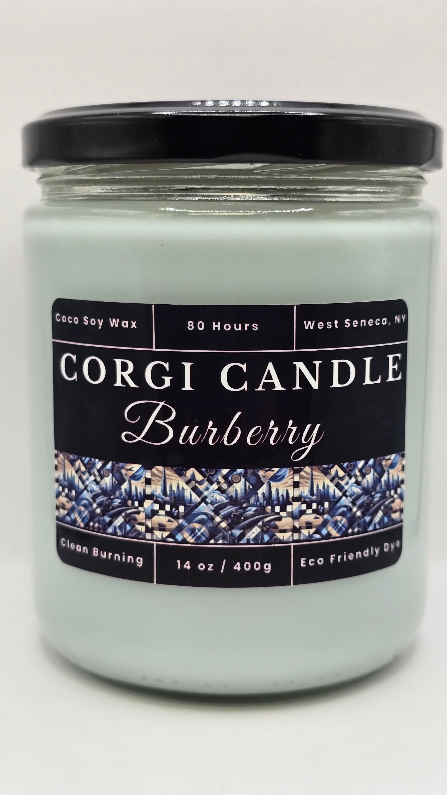 Burberry 14 oz soy candle in a matte black glass jar with a minimal label, inspired by classic men’s cologne, hand-poured by CORGI CANDLE