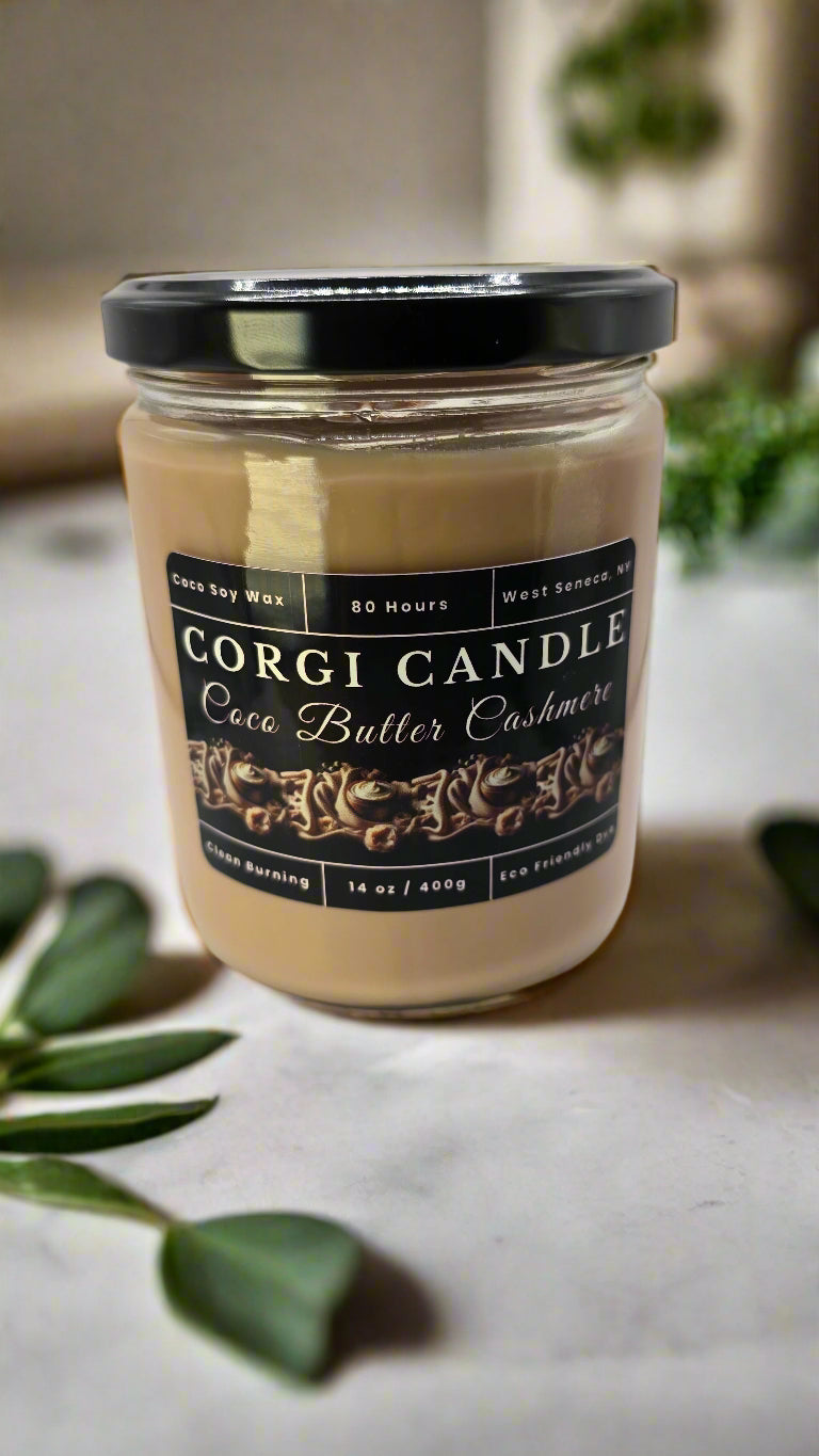 Coco Butter Cashmere 14 oz soy candle by CORGI CANDLE in a soft neutral setting, showcasing creamy coconut and vanilla tones
