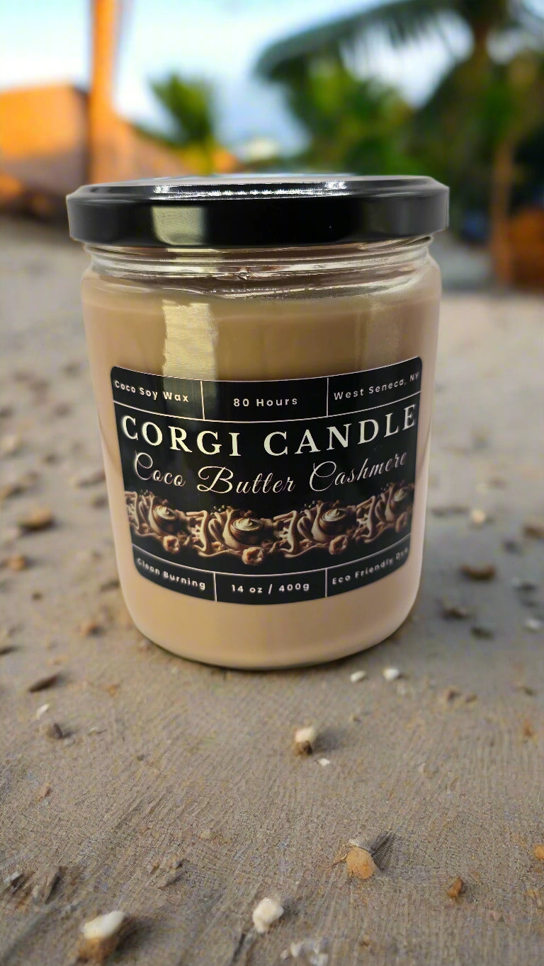 Coco Butter Cashmere 14 oz soy candle by CORGI CANDLE in a soft neutral setting, showcasing creamy coconut and vanilla tones