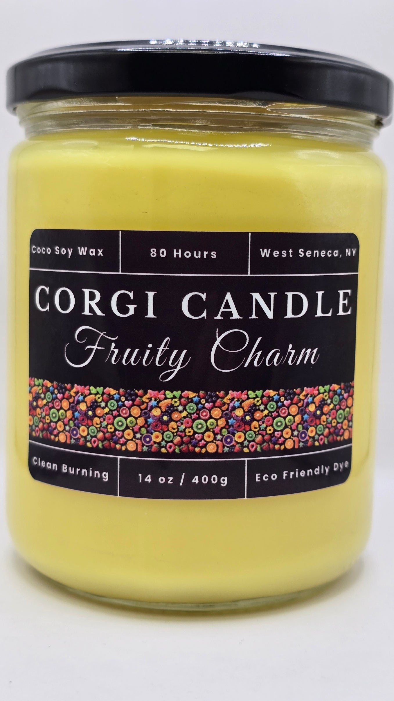 Fruity Charm 14 oz soy candle in a playful label and clear jar, hand-poured by CORGI CANDLE, featuring a scent inspired by Fruity Pebbles cereal.
