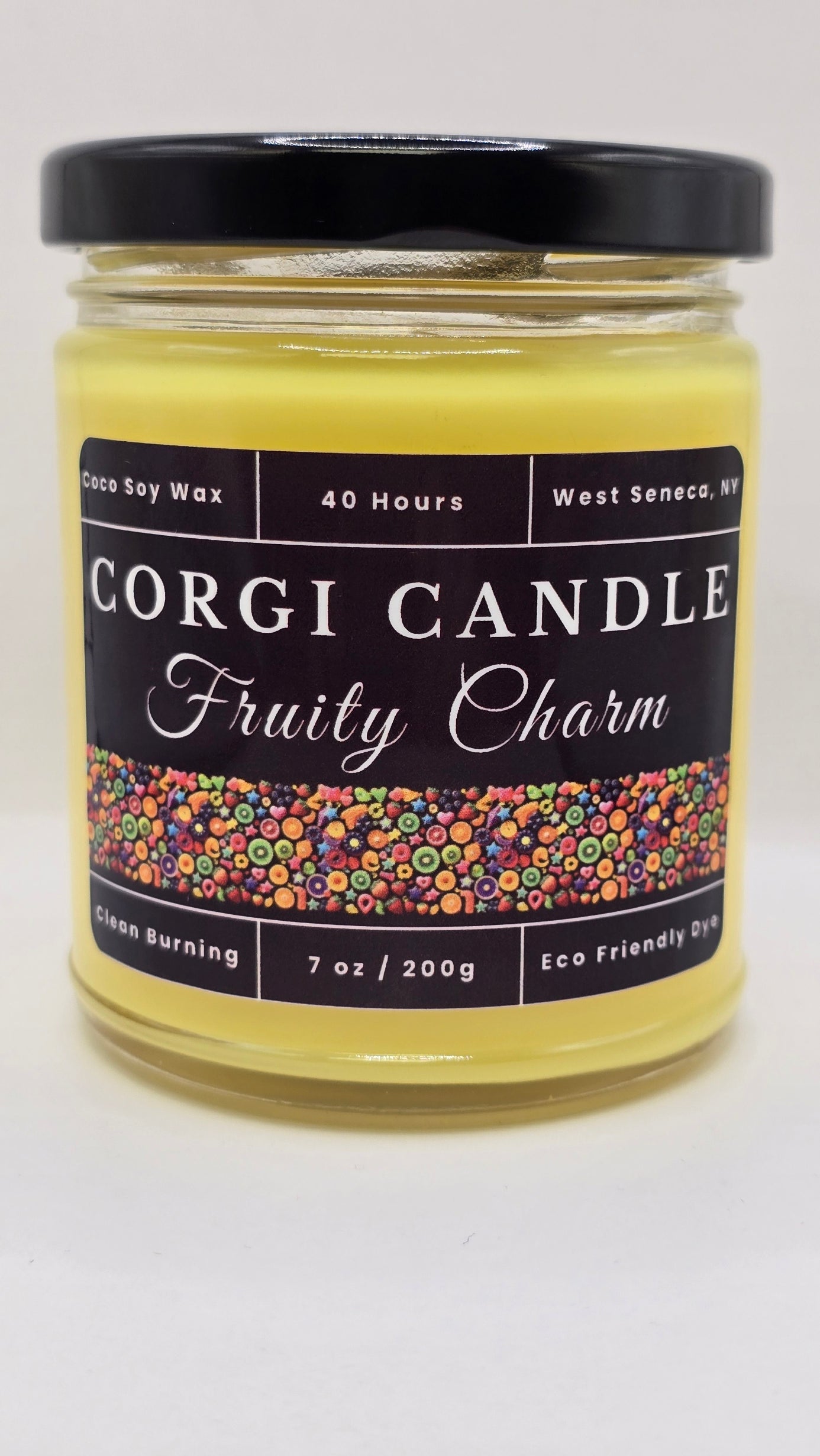 Fruity Charm 7 oz soy candle by CORGI CANDLE in a clear glass jar with a vibrant label, inspired by the scent of Fruity Pebbles cereal.