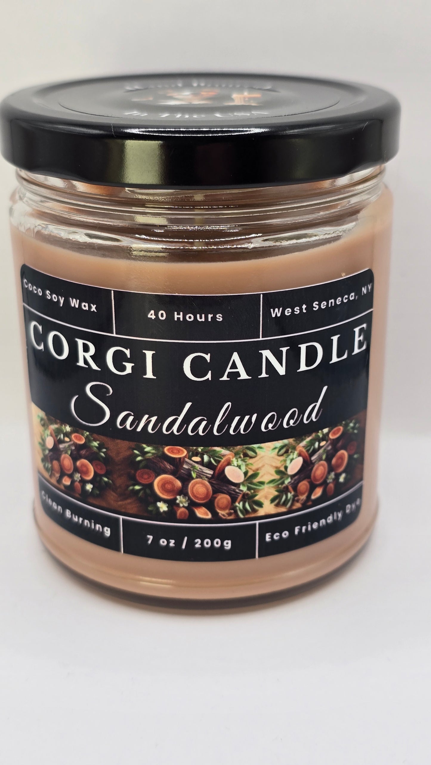 Sandalwood soy candle in a warm-toned glass jar with a minimalist label, featuring a rich sandalwood scent with notes of musk and vanilla, hand-poured by CORGI CANDLE.