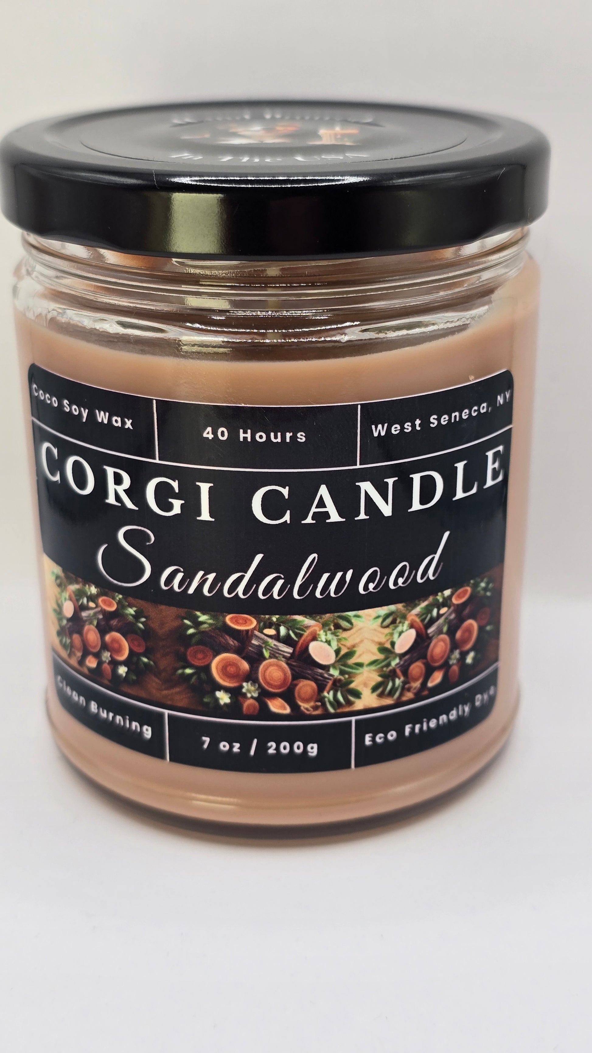 Sandalwood soy candle in a warm-toned glass jar with a minimalist label, featuring a rich sandalwood scent with notes of musk and vanilla, hand-poured by CORGI CANDLE.