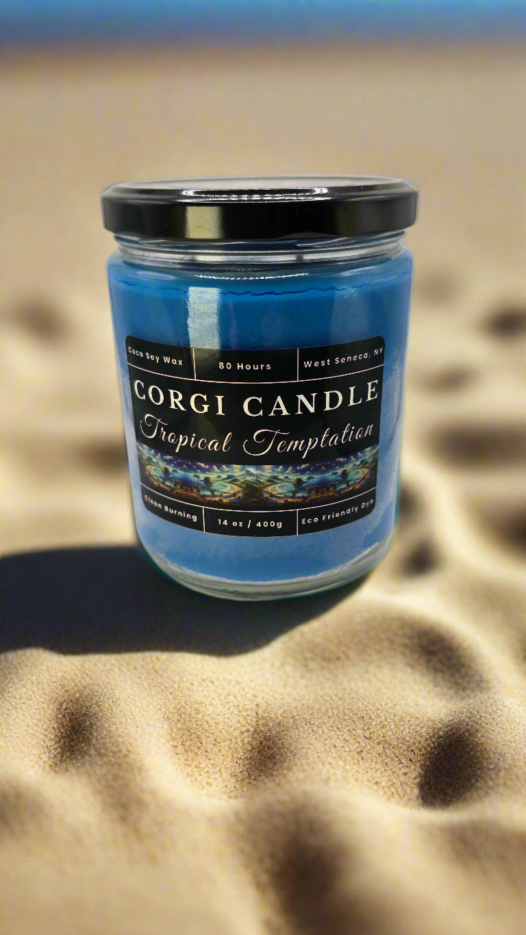 Tropical Temptation 14 oz soy candle in a coastal-inspired glass jar with clean label, featuring a warm scent of pistachio, caramel, vanilla, and sandalwood by CORGI CANDLE