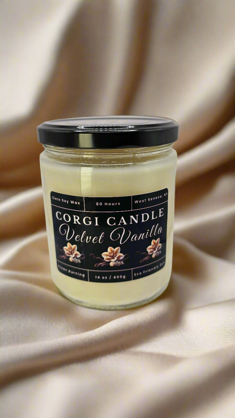 Velvet Vanilla 14 oz soy candle in a soft cream-toned glass jar with minimalist label, featuring vanilla, tonka bean, and sandalwood by CORGI CANDLE.