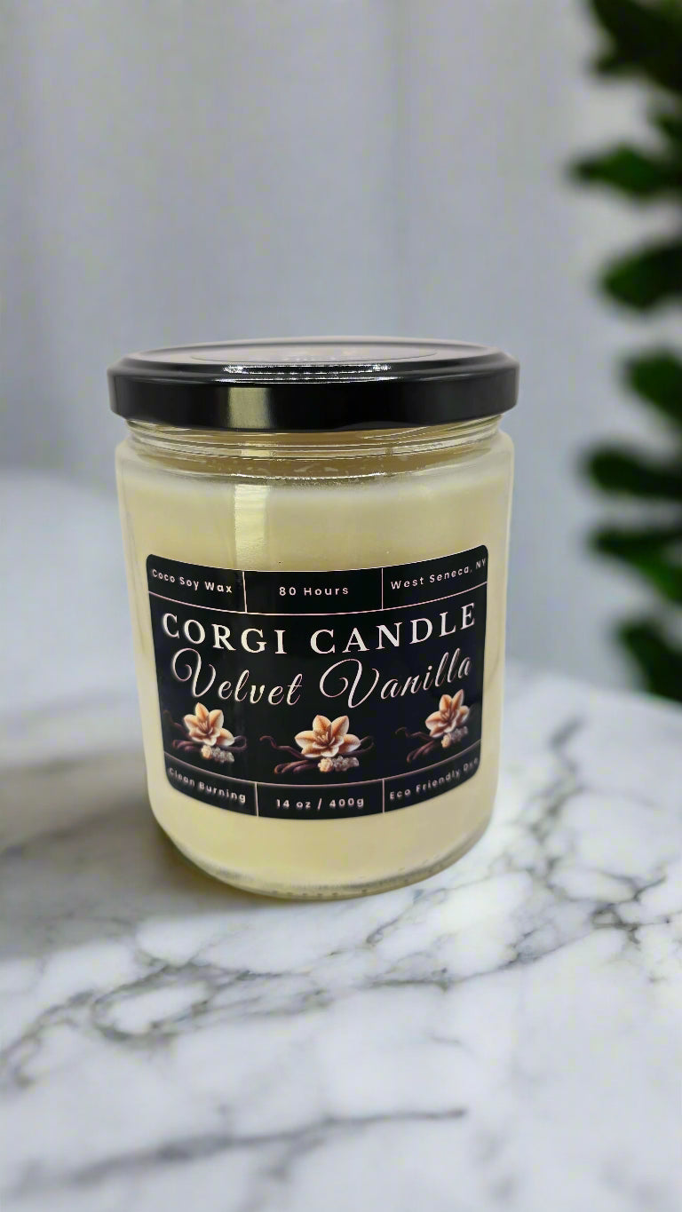 Velvet Vanilla 14 oz soy candle in a soft cream-toned glass jar with minimalist label, featuring vanilla, tonka bean, and sandalwood by CORGI CANDLE