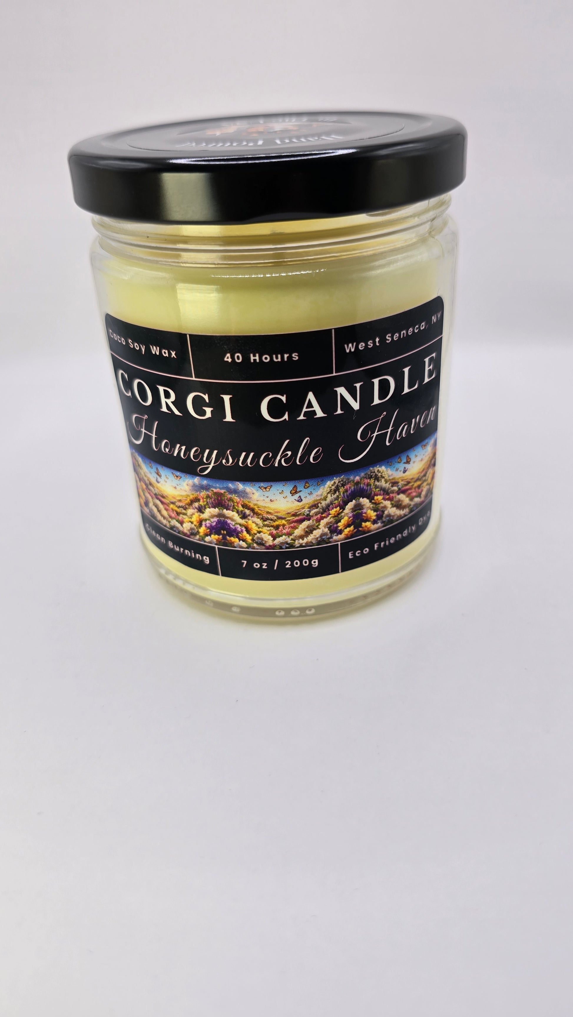 Honeysuckle Haven 7 oz soy candle in a glass jar, hand-poured by CORGI CANDLE with notes of honeysuckle, jasmine, and soft white woods.