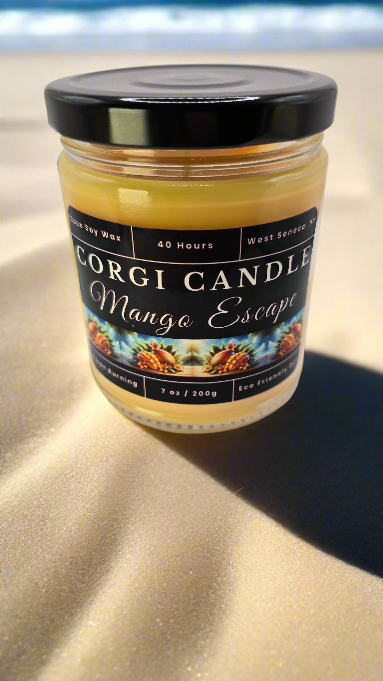 Mango Escape candle in a glass jar, hand-poured with soy coconut wax, featuring notes of mango, pineapple, coconut, and vanilla