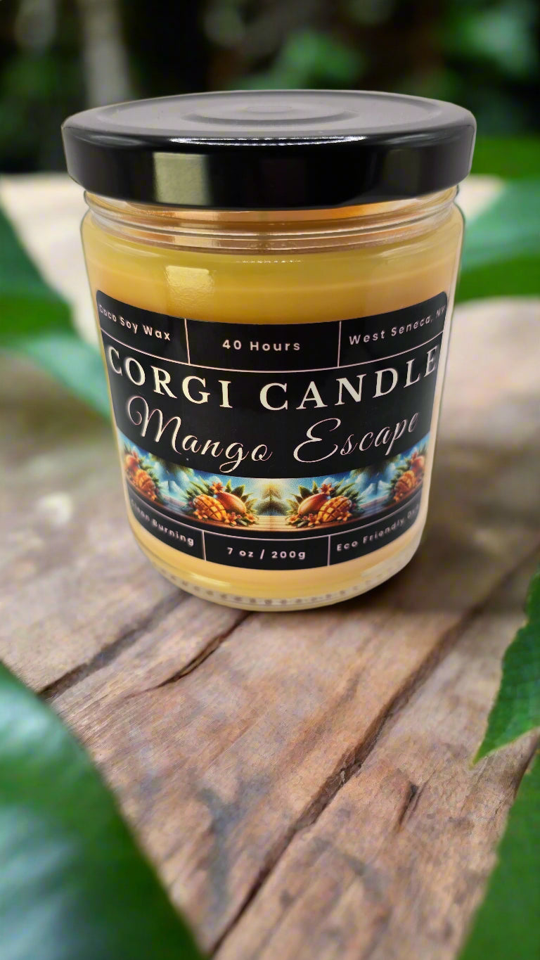 Mango Escape candle in a glass jar, hand-poured with soy coconut wax, featuring notes of mango, pineapple, coconut, and vanilla