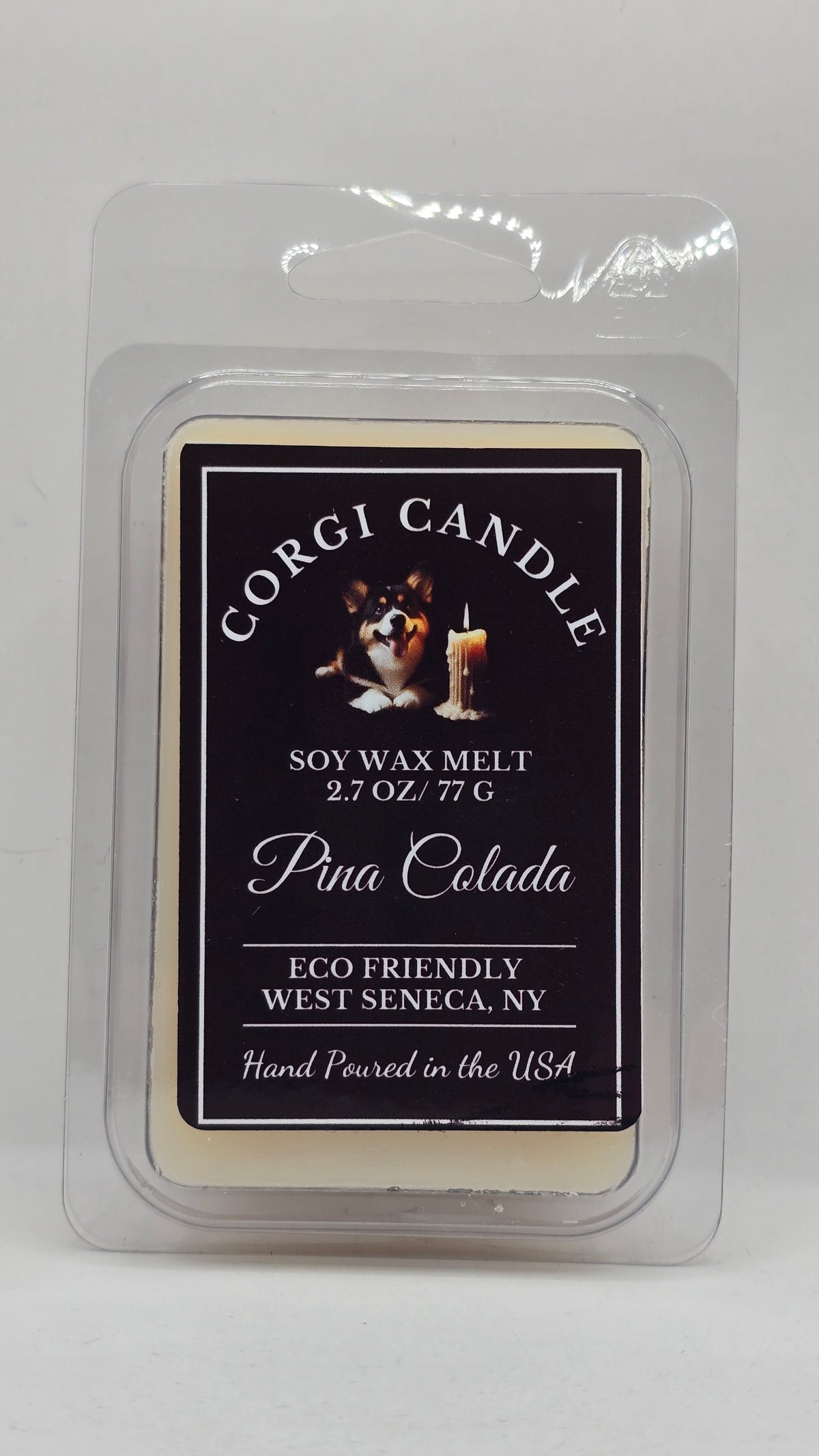 A packaged soy wax melt from Corgi Candle, specifically 'Pina Colada' scent, in a clear plastic clamshell package on a white background.
