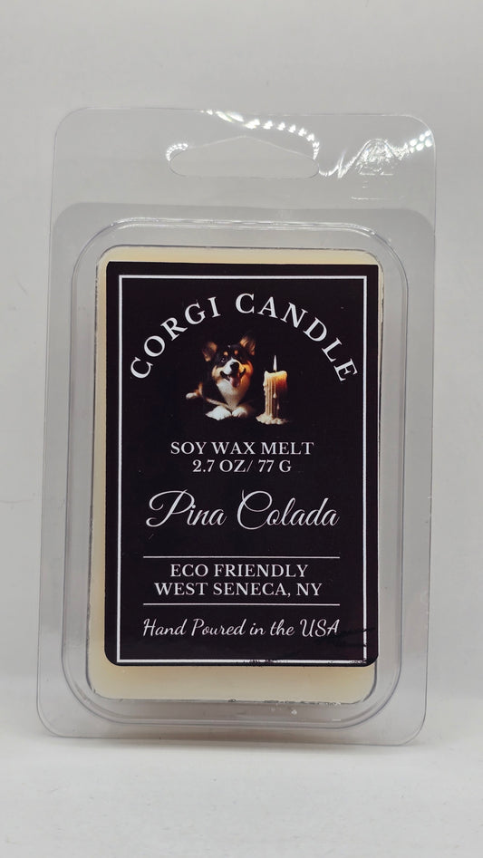 A packaged soy wax melt from Corgi Candle, specifically 'Pina Colada' scent, in a clear plastic clamshell package on a white background.