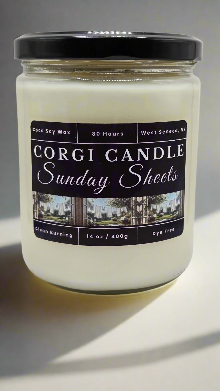 Sunday Sheets 14 oz soy candle by CORGI CANDLE in glass jar with fresh linen scent and clean-burning, eco-friendly ingredients