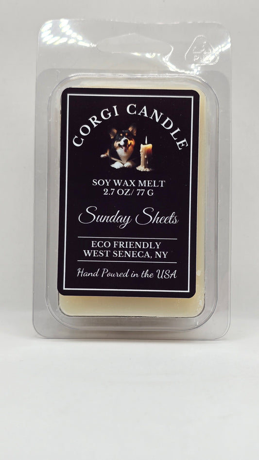 Sunday Sheets soy wax melt by CORGI CANDLE in clear clamshell packaging with label showing scent name, 2.7 oz clean linen scented wax melt hand poured in West Seneca NY.