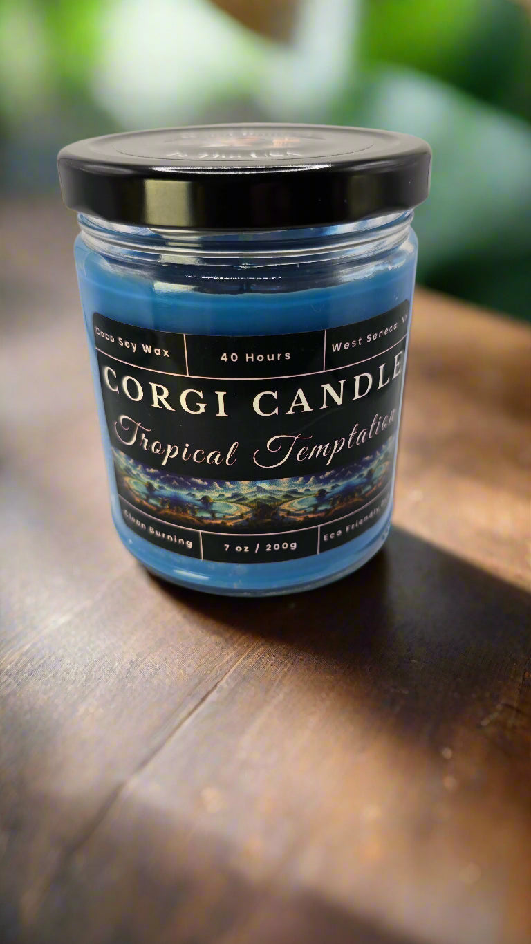 Tropical Temptation 7 oz soy candle in a glass jar with a beach-inspired label, hand-poured by CORGI CANDLE and scented with a Brazilian Crush blend of pistachio, salted caramel, vanilla, and sandalwood.