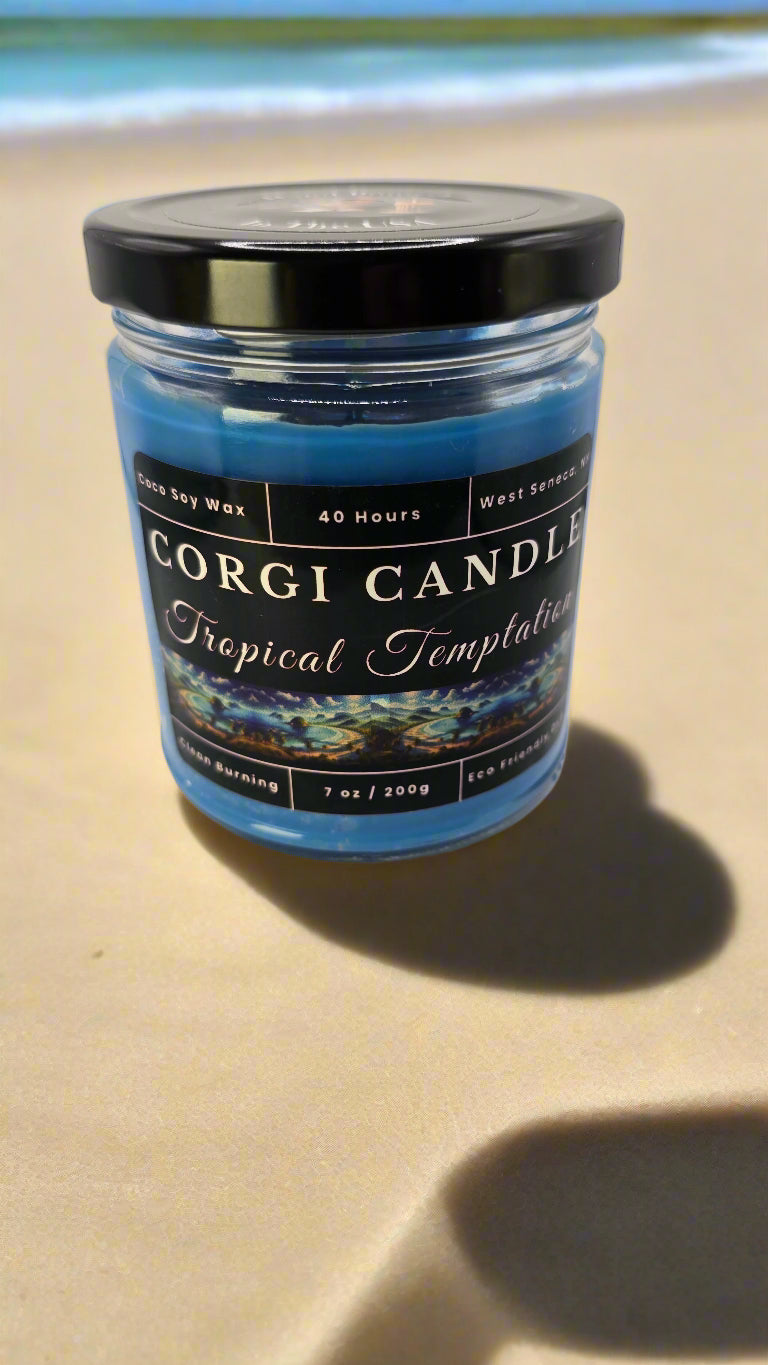 Tropical Temptation 7 oz soy candle in a glass jar with a beach-inspired label, hand-poured by CORGI CANDLE and scented with a Brazilian Crush blend of pistachio, salted caramel, vanilla, and sandalwood.